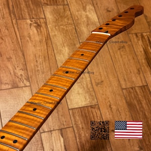 May include: A guitar neck with a flamed maple finish. The neck has black fret markers and silver frets. The headstock has tuning peg holes. The image includes the text "Guitar_Closet eBay", a QR code, and a small American flag.