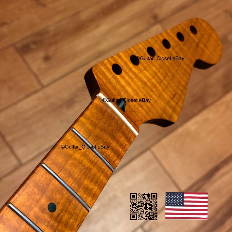 May include: A guitar neck with a flamed maple finish. The headstock has six tuning peg holes. The fretboard has silver frets and dark inlays. The text "Guitar_Closet eBay" is visible. An American flag and a QR code are in the lower right corner.