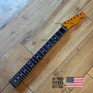 May include: A guitar neck with a natural wood finish on the headstock and a dark fretboard with white dot inlays. The neck is angled on a wooden surface. The image includes the text "@Guitar Closet eBay" and a QR code and American flag.
