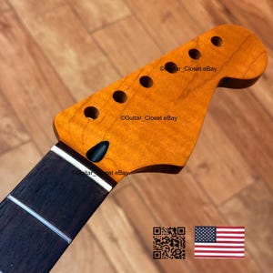 May include: A rustic wooden sign with the text "Welcome to our home" in a handwritten style. The sign is rectangular, with a distressed finish, and features a simple, inviting design. It's suitable for indoor or outdoor use.