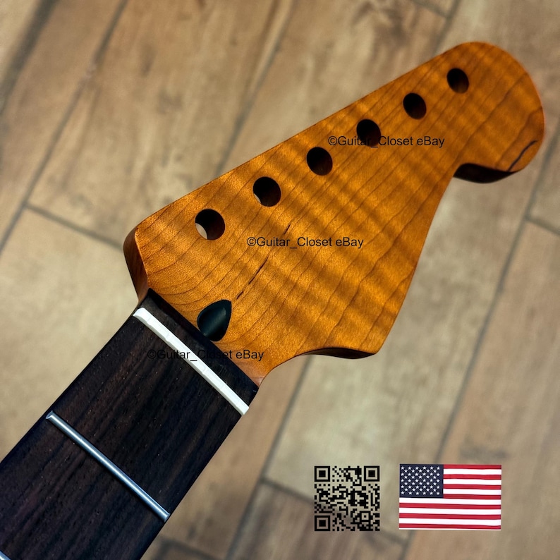 May include: A guitar neck with a flamed maple headstock and a dark rosewood fretboard. The headstock has six tuning peg holes and a natural finish. The fretboard has silver frets and white binding. The text "Guitar Closet eBay" is visible.