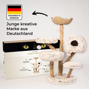 Puede incluir: Un &aacute;rbol para gatos de varios niveles con una cesta tejida y plataformas de felpa. La estructura de madera est&aacute; cubierta con un material suave y esponjoso. La caja del embalaje muestra el texto "COZY CHA" y "DESIGNED IN GERMANY".