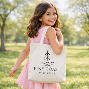 May include: A cream-coloured tote bag featuring a black tree and wave design, with the text "PINE COAST MOCKUPS". The bag is carried by a person in a pink dress.
