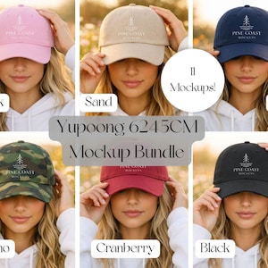May include: A mockup bundle of six different colored baseball caps, including pink, sand, navy, camo, cranberry, and black. Each cap features the "Pine Coast Mockups" logo. The text "Yupoong 6245CM Mockup Bundle" is also visible.