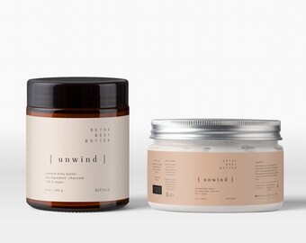 May include: Two jars of body butter are displayed against a white background. The larger jar has a dark brown lid and a beige label with the text "unwind". The smaller jar has a silver lid and a similar label. Both jars are labeled "Detox Body Butter".