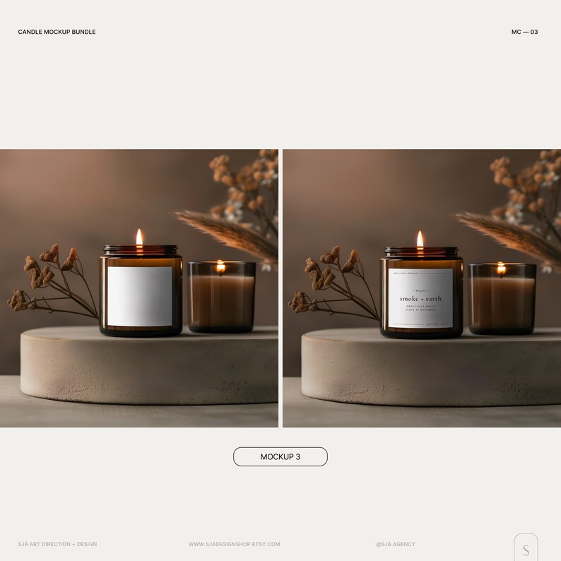 May include: Two amber glass candle jars with labels. One jar has a white label with the text "smoke + earth" and the other jar has a blank white label. Both jars are lit and sitting on a gray concrete platform with dried flowers and tall grass behind them.