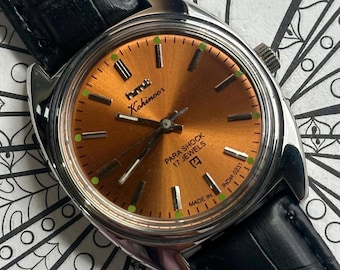 Vintage mekanisk klocka från HMT Kohinoor: orange urtavla, 17 juveler