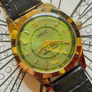 Vintage ORIS Parrot Dial Watch: Gold Case, Swiss Made, FHF Movement