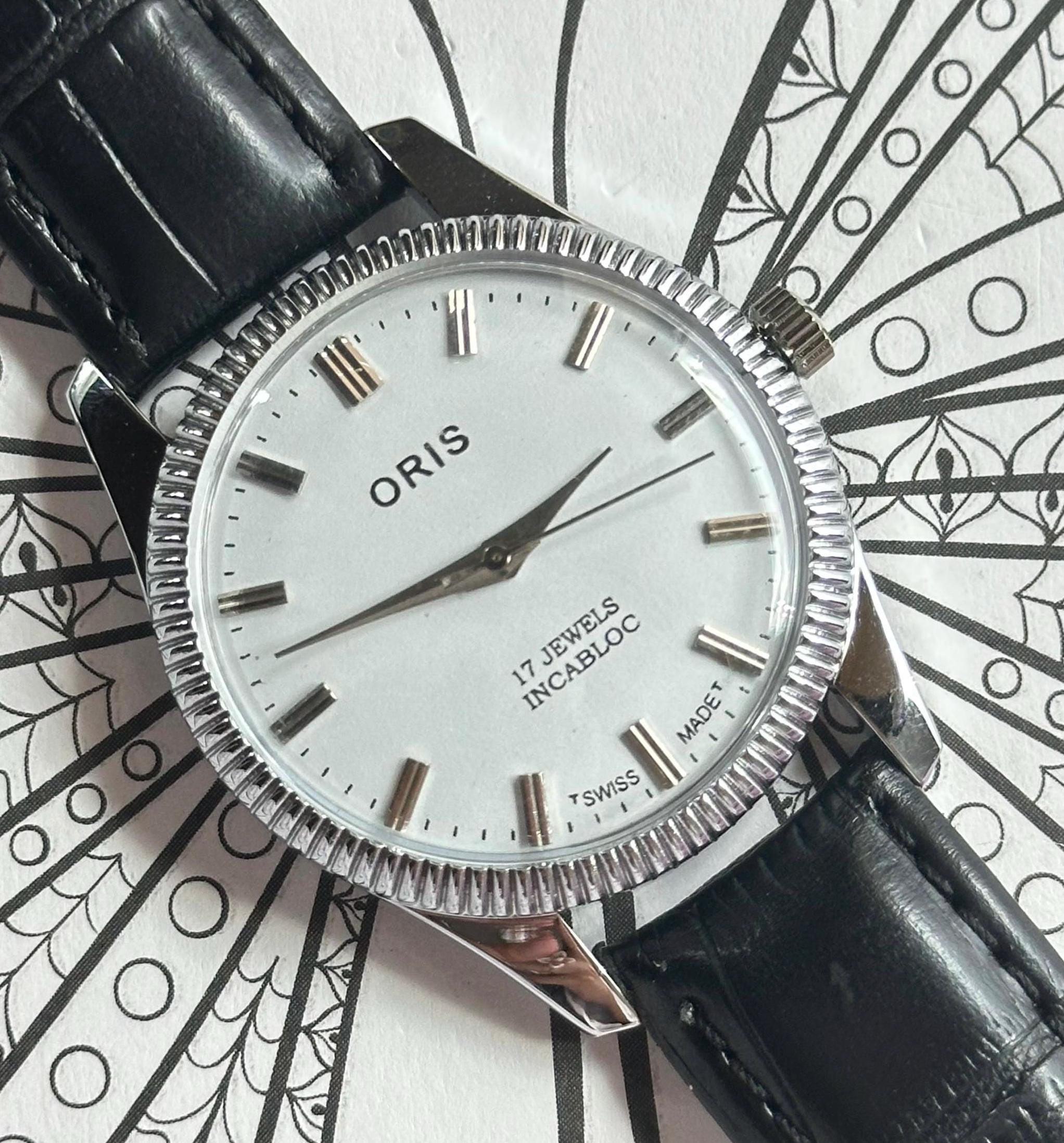 ヴィンテージ ORIS ホワイトダイヤル 機械式手巻き FHFムーブメント ST 