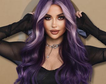 May include: A long, wavy wig with a blend of purple and light lavender tones. The wig features a dark root and a highlighted front section. The text "Wig Thaleya" is in the upper left corner. The wig is styled with a deep side part.
