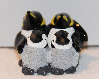 Emperor Penguin family of 4