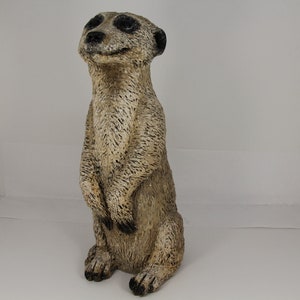 Meerkat statue, alert and ready.