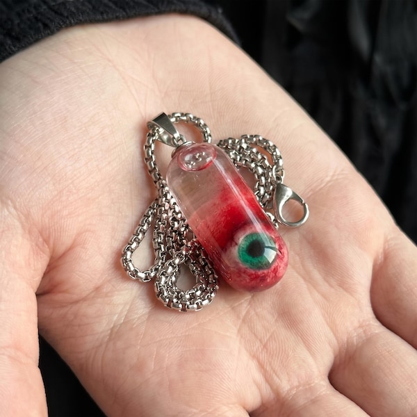 Collar con ojo móvil que brilla en la oscuridad, colgante gótico de resina, joyería de Halloween, regalo espeluznante para cosplay