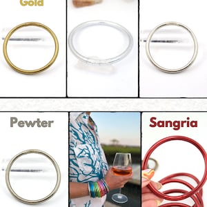 May include: Assortment of bangles in various colors and finishes. The image displays bangles in antique gold, silver, dark silver, pewter, and sangria. The bangles are round and appear to be made of metal or a similar material.