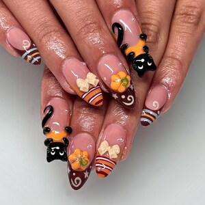 Fall Black Cat Press On Nails, Pumpkin 3D Nail Art, Brown and Orange Candy Stripes, Cute Bow Details, Autumn Almond Nails, Thanksgiving nail