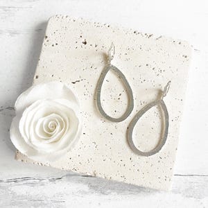 Open Teardrop Earrings in Brushed Silver. Simple Statement Teardrop Hoop Earrings