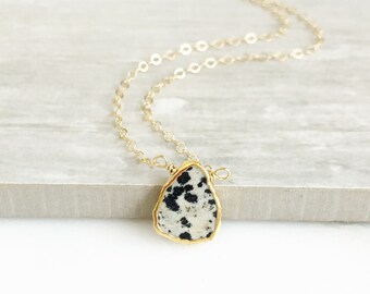 very nice piece of jewelry for a lucky person. Beautiful Dalmatian Jasper Gemstone Pendant on an elegant 10k Gold Uni-link necklace Very