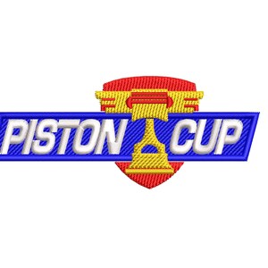 May include: Embroidered patch featuring the words "PISTON CUP" in white, set against a blue banner. A red and yellow shield with a trophy design is centered above the text. The design is on a white background.