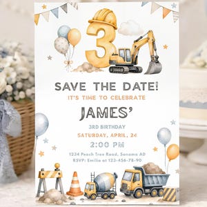 May include: A rectangular invitation card featuring construction-themed illustrations including a yellow excavator, a cement mixer, a dump truck, and a large number 3 wearing a hard hat. Text includes SAVE THE DATE, JAMES' 3RD BIRTHDAY, APRIL 24, 2:00 PM.