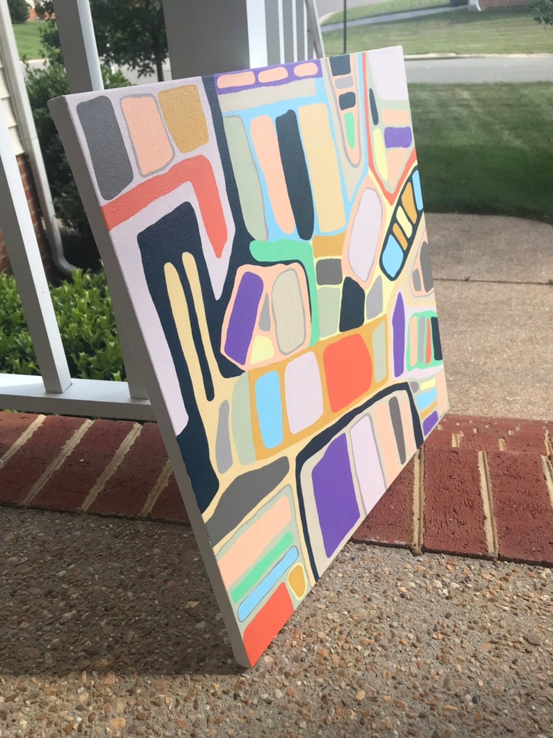 May include: Abstract painting on canvas with geometric shapes in various colors, including black, white, red, orange, yellow, green, blue, purple, and brown.