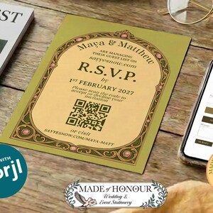 May include: A wedding invitation with the text "R.S.V.P." and a QR code, along with a smartphone, eyeglasses, and a plate of cookies. The invitation is olive green with gold accents. A cup of tea and a magazine are also present.