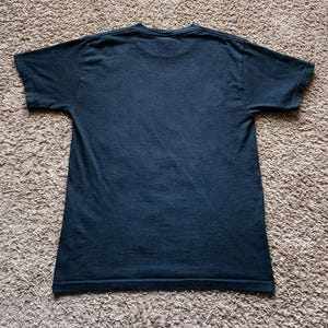 Camiseta vintage de Iron Man para niño, talla mediana, estampado gráfico, color negro. imagen 4