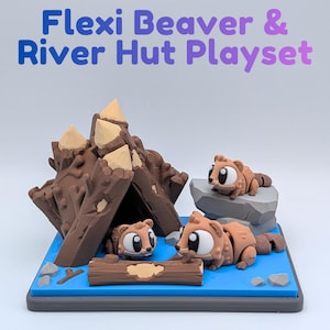 May include: A Flexi Beaver & River Hut Playset. The playset features a brown beaver hut with tan accents, three brown beavers, a gray rock, and a log on a blue base. The text "Flexi Beaver & River Hut Playset" is at the top.