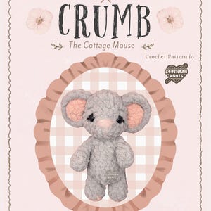 May include: A crochet pattern document titled CRUMB The Cottage Mouse by Southern Knots. The document features a light pink background with a scalloped border, floral accents, and a central oval frame containing a gray plush mouse toy.