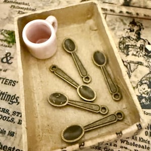 miniature dollhouse vintage metal spoons-3 in set.
