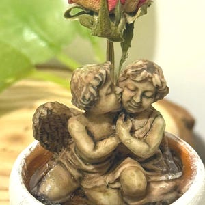 miniature pot with angels. 1:12 scale.