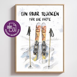 May include: A framed print with a pair of skis and poles, with the German text "Ein Paar Flocken für die Piste". The skis are yellow and orange, with the number "50" on each. The image has a watercolor style, with a snowy landscape.