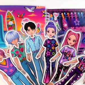 May include: A collection of six die-cut character stickers featuring diverse figures in colorful outfits, including a person with purple hair in a star-patterned vest, a person with blue hair in a floral shirt, and others in graphic tees and star-print pants.