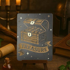 May include: A decorative card on a small easel features a gold illustration of an open treasure chest filled with coins, with the word "TREASURE" on a banner. The card is set on a wooden surface with a scroll, potion bottle, and lit candles.