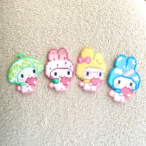 May include: Four pixel art character figures in pastel shades. Each figure holds a pink heart. The characters include a green figure with a hat, a pink figure with a bow, a yellow figure with glasses, and a blue figure with a hat.