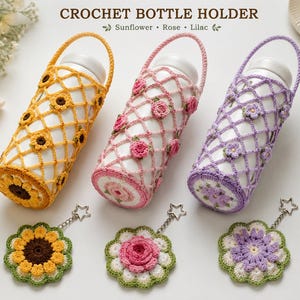 May include: Three crochet bottle holders with handles, each containing a white bottle. The holders are yellow with sunflowers, pink with roses, and purple with lilacs. Three matching flower-shaped keychains with star clips are also included.