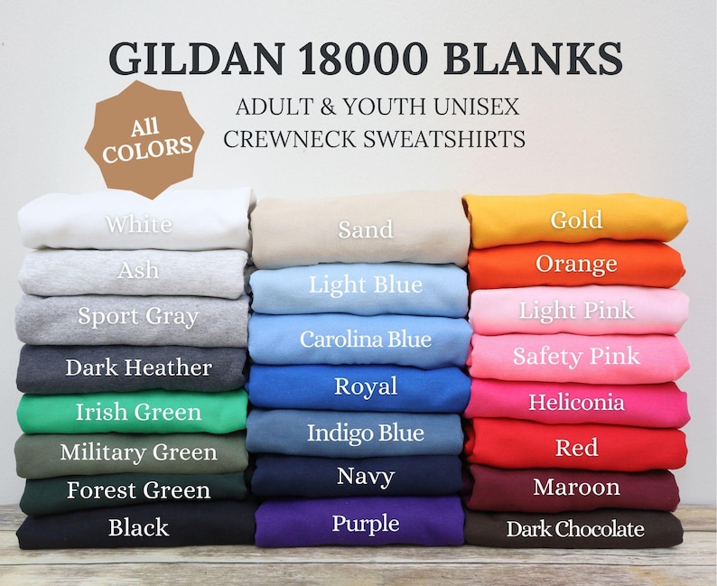 May include: A selection of Gildan 18000 unisex crewneck sweatshirts in a range of colours, including white, black, and navy. The image shows the available colours, such as light pink, orange, and maroon. Text on the image reads "GILDAN 18000 BLANKS" and "ADULT & YOUTH UNISEX CREWNECK SWEATSHIRTS."