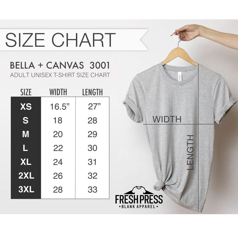 May include: A gray Bella + Canvas 3001 adult unisex t-shirt hanging on a wooden hanger. The image includes a size chart with measurements in inches for XS to 3XL sizes. The brand logo "FRESH PRESS" is visible.