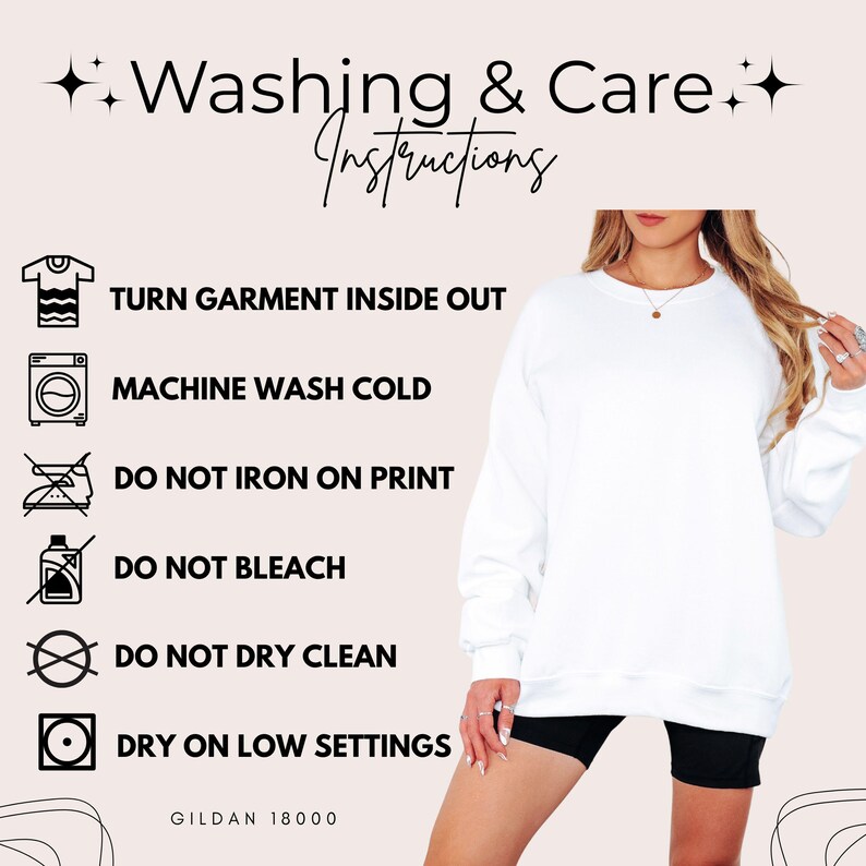 May include: White crewneck sweatshirt with washing instructions. The text reads: Turn garment inside out, machine wash cold, do not iron on print, do not bleach, do not dry clean, dry on low settings. The brand is Gildan 18000.