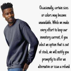 May include: A navy blue sweatshirt. The image includes text that reads: "Occasionally, certain sizes or colours may become unavailable. While we make every effort to keep our inventory current, if you select an option that is out of stock, we will notify you promptly to offer an alternative or issue a refund."