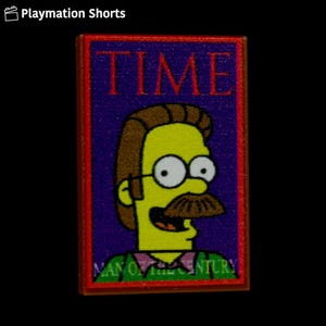 May include: A rectangular patch featuring a cartoon character with yellow skin, brown hair, a mustache, and glasses. The patch has the word "TIME" in red letters at the top and "MAN OF THE CENTURY" at the bottom, all on a purple background.