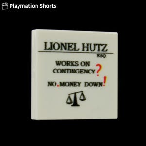 May include: A white square with black text that reads "LIONEL HUTZ, ESQ" and "WORKS ON CONTINGENCY? NO, MONEY DOWN!" A scale icon is at the bottom. The image is from Playmation Shorts.
