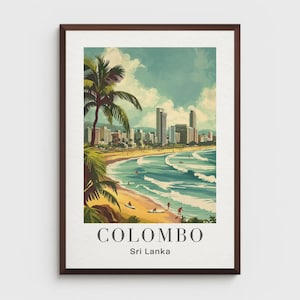 May include: Framed print of Colombo, Sri Lanka, depicting a beach with palm trees, ocean waves, and a city skyline. The artwork has a vintage travel poster style with the city name and country below.