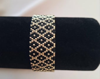 Zwart en goudkleurige kraalarmband, verstelbare boho-statementarmband, damesarmband met gouden kralen