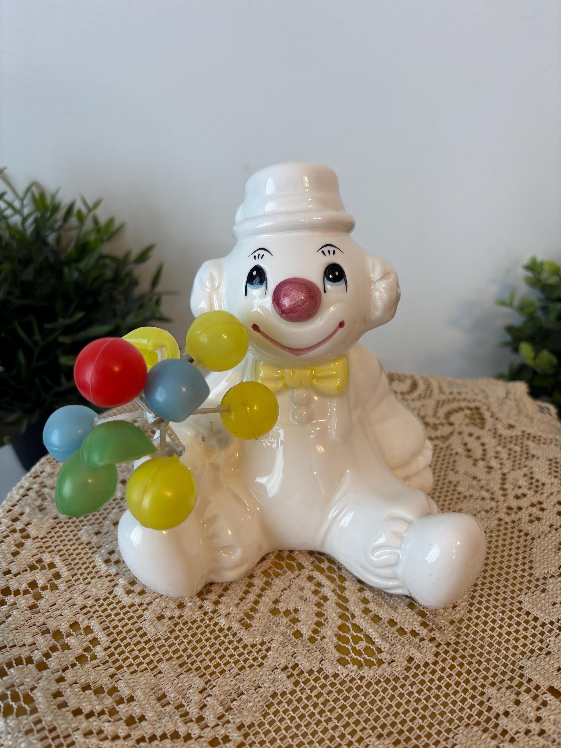 Tirelire Mécanique - Clown sur boule colorée - Fonte - Hauteur 23 cm