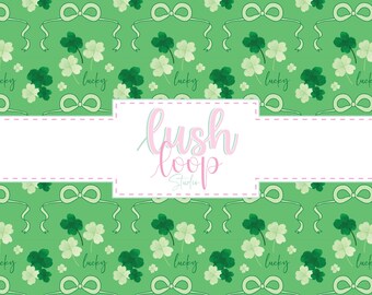 May include: A green background with a repeating pattern of shamrocks, bows, and the word "lucky" in white script. The text "lush loop studio" is in a white rectangle with pink and blue script.