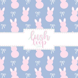 May include: A light blue background featuring a pattern of pink bunny shapes and white bows. The image includes the text "Lush Loop Studio" in a cursive font within a white rectangular frame.