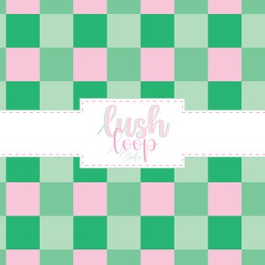 May include: A seamless pattern with a green and pink chequered design. The pattern includes the text "lush loop Studio" in a cursive font, set against a white rectangular background.