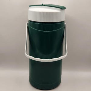 May include: A handmade wooden sign with the text "Welcome" in a handwritten style. The sign is painted white with a distressed finish and features a decorative floral design. It is designed to be hung on a door or wall.