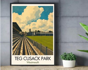 May include: A framed art print featuring a stadium with empty bleachers, a green field, and a blue sky with large white clouds. The text at the bottom reads TEG CUSACK PARK Westmeath in black capital letters and smaller font below.