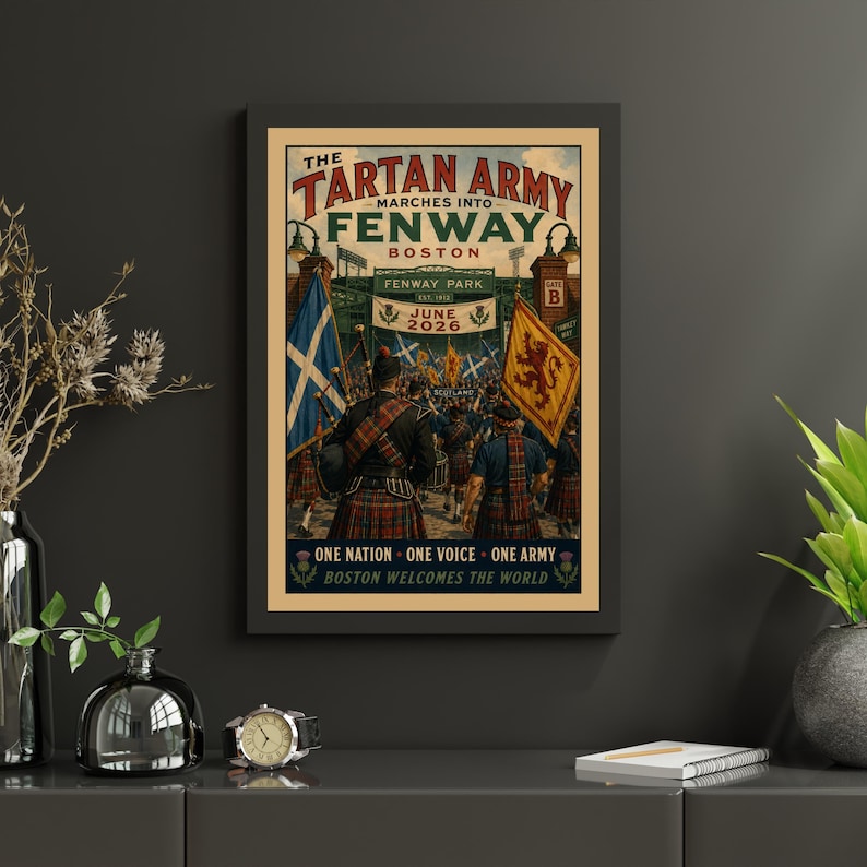 May include: A framed poster titled The Tartan Army Marches Into Fenway Boston June 2026. The illustration depicts a crowd of people in kilts carrying Scottish flags and a yellow banner with a red lion, standing before the Fenway Park entrance.